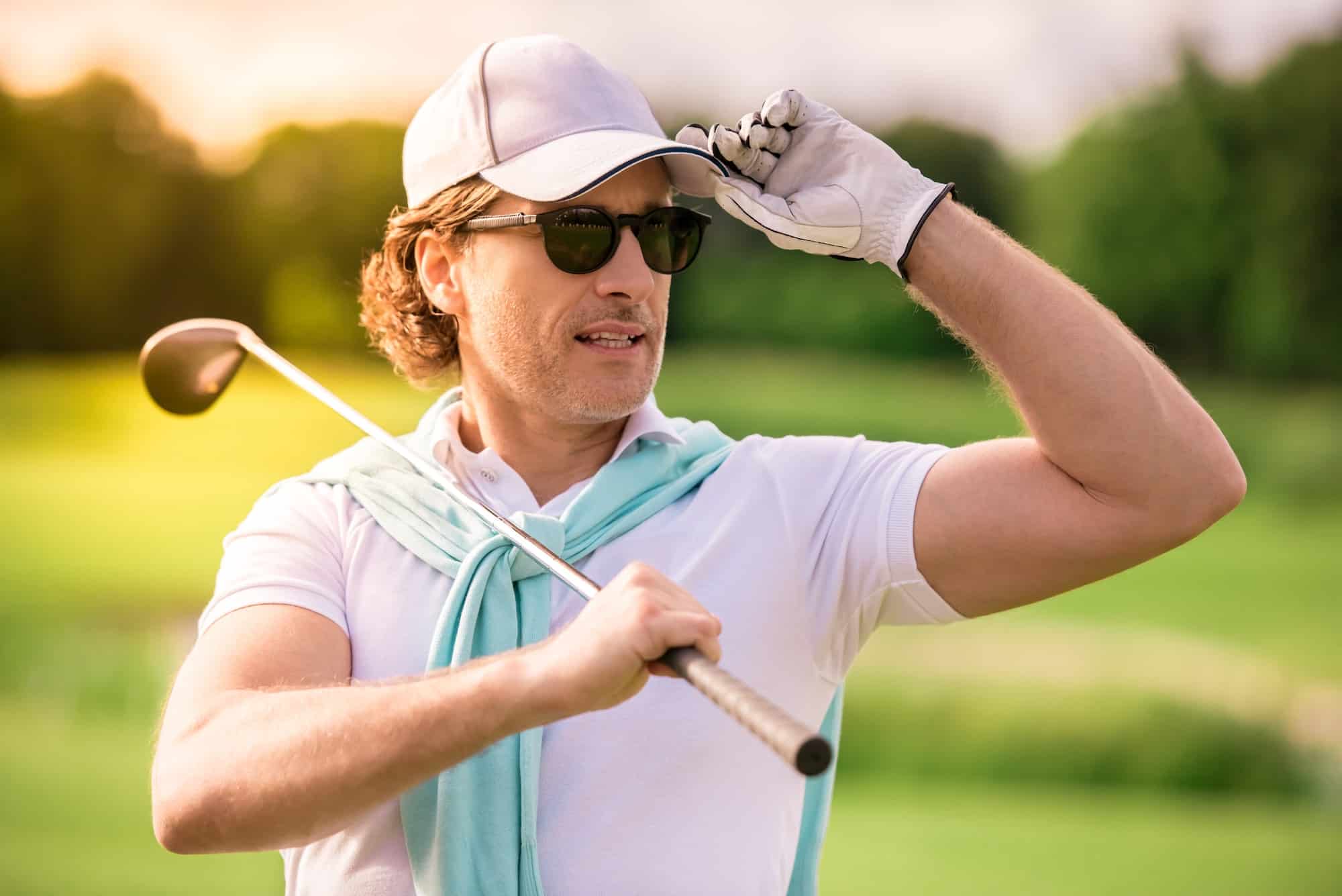 Man playing golf